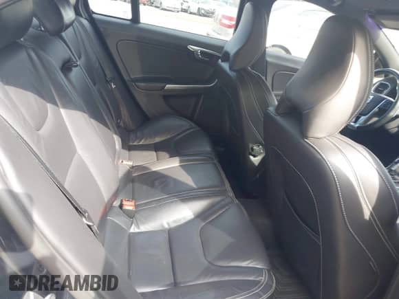 2015 Volvo S60 T5 Drive-E Premier with VIN YV126MFB9F1299878, listed as a IAAI auction lot 42781752 with 128,657 mi miles and . Bid and sale history available at DreamBid. Image 8.