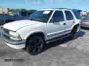 2001 Chevrolet Blazer LT z VIN 1GNCS13W312154972, wystawiony jako IAAI lot #42779419 z przebiegiem 179 163 mil mil oraz . Historia ofert i sprzedaży dostępna na DreamBid. Obrazek 2.