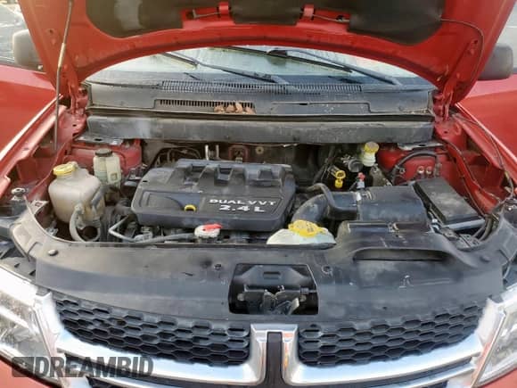 2014 Dodge Journey SE with VIN 3C4PDCAB3ET263081, listed as a Copart auction lot 82758915 with 136,870 mi miles and Clean title. Bid and sale history available at DreamBid. Image 12.