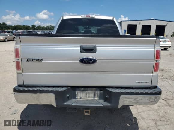2014 Ford F-150 XLT с VIN 1FTEW1CMXEFB66460, выставлен на аукционе Copart как лот 62214535 с пробегом 211 244 миль миль и Списание • Salvage title. История ставок и продаж доступна на DreamBid. Изображение 6.