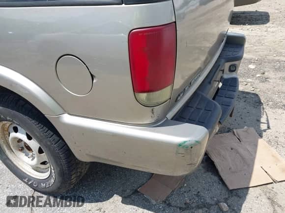 2002 Chevrolet Blazer LS z VIN 1GNDT13W92K219018, wystawiony jako IAAI lot #42967417 z przebiegiem 162 926 mil mil oraz . Historia ofert i sprzedaży dostępna na DreamBid. Obrazek 11.