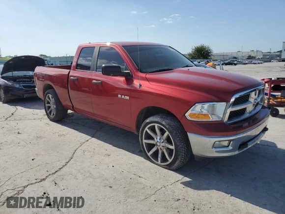 2009 Dodge 1500 SLT with VIN 1D3HB18P89S719073, listed as a Copart auction lot 61256445 with 193,892 mi miles and Salvage title. Bid and sale history available at DreamBid. Image 4.