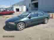 2000 Dodge Stratus ES with VIN 1B3EJ56H2YN258842, listed as a Copart auction lot 63436695 with 133,593 mi miles and Salvage title. Bid and sale history available at DreamBid. Image 1.
