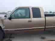 1996 Chevrolet Silverado 2500 с VIN 1GCGC29R9TE265378, выставлен на аукционе IAAI как лот 41081778 с пробегом 345 615 миль миль и . История ставок и продаж доступна на DreamBid. Изображение 14.