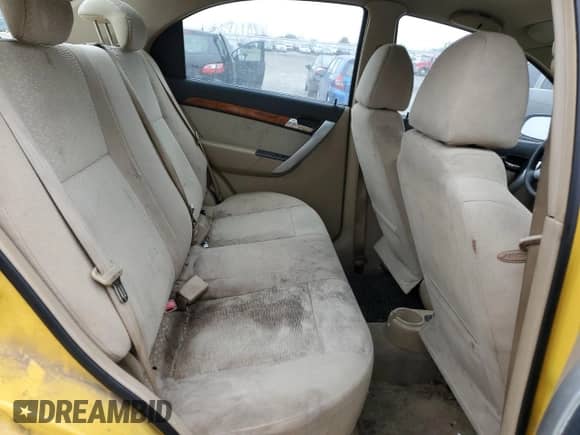 2009 Chevrolet Aveo 2LT z VIN KL1TG56E59B332694, wystawiony jako Copart lot #79700764 z przebiegiem 117 547 mil mil oraz Czysty tytuł • Clean title. Historia ofert i sprzedaży dostępna na DreamBid. Obrazek 10.