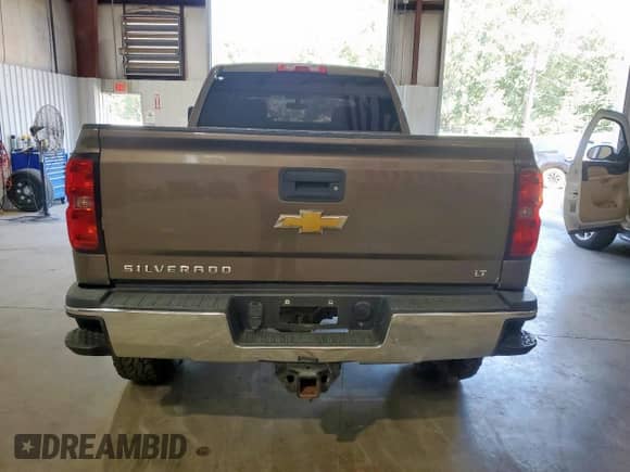 2015 Chevrolet Silverado 2500HD LT z VIN 1GC1KVEG0FF115561, wystawiony jako Copart lot #71635615 z przebiegiem Nie podano mil oraz Szkoda całkowita • Salvage title. Historia ofert i sprzedaży dostępna na DreamBid. Obrazek 6.