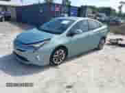 2017 Toyota Prius Two z VIN JTDKARFU1H3036374, wystawiony jako IAAI lot #42522030 z przebiegiem 101 127 mil mil oraz . Historia ofert i sprzedaży dostępna na DreamBid. Obrazek 2.