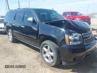 2009 Chevrolet Suburban LTZ z VIN 1GNFK36359R219818, wystawiony jako IAAI lot #42120323 z przebiegiem 146 999 mil mil oraz . Historia ofert i sprzedaży dostępna na DreamBid. Obrazek 1.
