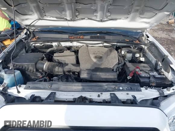 2019 Toyota Tacoma SR with VIN 3TMCZ5ANXKM257869, listed as a IAAI auction lot 41715668 with 99,452 mi miles and . Bid and sale history available at DreamBid. Image 10.