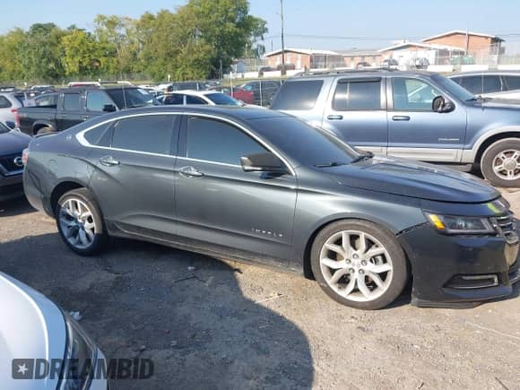 2014 Chevrolet Impala LT with VIN 2G1125S33E9242872, listed as a IAAI auction lot 43201724 with 175,800 mi miles and . Bid and sale history available at DreamBid. Image 13.