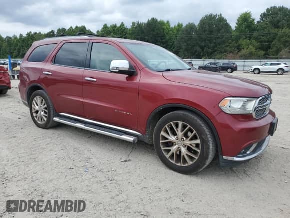2014 Dodge Durango Citadel with VIN 1C4RDHEG1EC390080, listed as a Copart auction lot 59801605 with 148,878 mi miles and Salvage title. Bid and sale history available at DreamBid. Image 4.