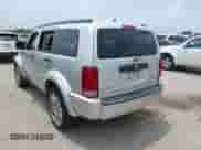 2011 Dodge Nitro Heat with VIN 1D4PT4GX0BW589571, listed as a IAAI auction lot 42620866 with 206,844 mi miles and . Bid and sale history available at DreamBid. Image 3.
