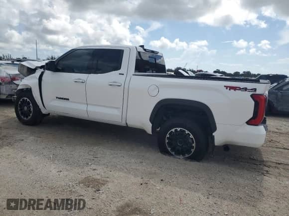2023 Toyota Tundra SR5 with VIN 5TFLA5DA7PX091909, listed as a Copart auction lot 65140335 with 41,553 mi miles and Salvage title. Bid and sale history available at DreamBid. Image 2.