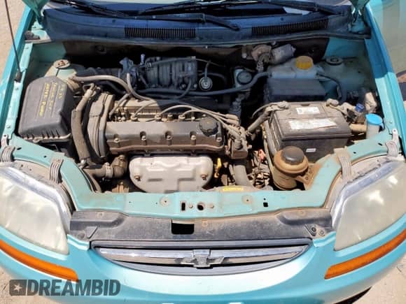 2005 Chevrolet Aveo LS z VIN KL1TD526X5B384453, wystawiony jako Copart lot #63617365 z przebiegiem 102 437 mil mil oraz Szkoda całkowita • Salvage title. Historia ofert i sprzedaży dostępna na DreamBid. Obrazek 11.