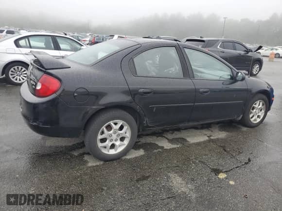 2002 Dodge Neon ES with VIN 1B3ES56C02D577803, listed as a Copart auction lot 58838175 with 72,105 mi miles and Salvage title. Bid and sale history available at DreamBid. Image 3.