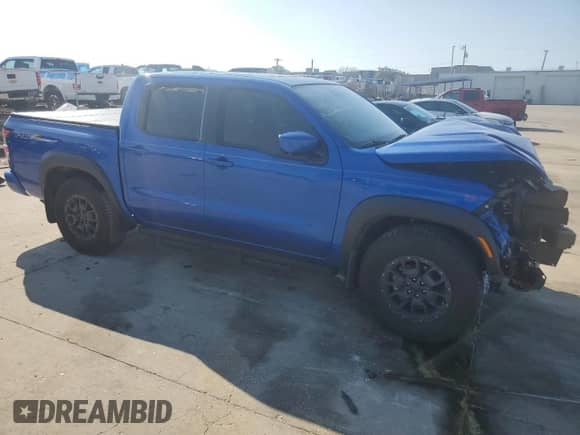 2024 Nissan Frontier Pro-X with VIN 1N6ED1EJ2RN646428, listed as a Copart auction lot 44304215 with 5,853 mi miles and Salvage title. Bid and sale history available at DreamBid. Image 4.