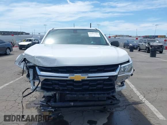 2021 Chevrolet Colorado 2WD Work Truck z VIN 1GCHSBEA9M1137030, wystawiony jako IAAI lot #42951242 z przebiegiem 63 954 mil mil oraz . Historia ofert i sprzedaży dostępna na DreamBid. Obrazek 13.