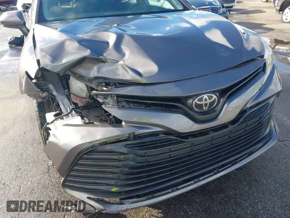 2019 Toyota Camry SE z VIN 4T1B11HK6KU831382, wystawiony jako IAAI lot #43426768 z przebiegiem 137 060 mil mil oraz . Historia ofert i sprzedaży dostępna na DreamBid. Obrazek 6.