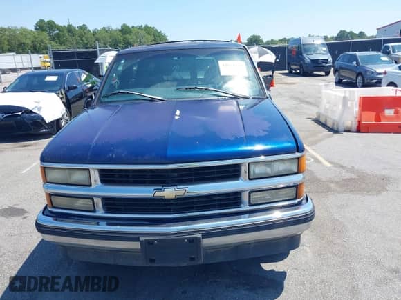 1997 Chevrolet Suburban z VIN 3GNEC16R8VG111155, wystawiony jako IAAI lot #42634153 z przebiegiem 282 812 mil mil oraz . Historia ofert i sprzedaży dostępna na DreamBid. Obrazek 12.