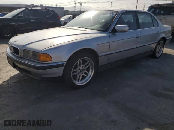 1997 BMW 7 Series 740iL with VIN WBAGJ8328VDM00702, listed as a Copart auction lot 63689375 with 210,180 mi miles and Clean title. Bid and sale history available at DreamBid. Image 1.