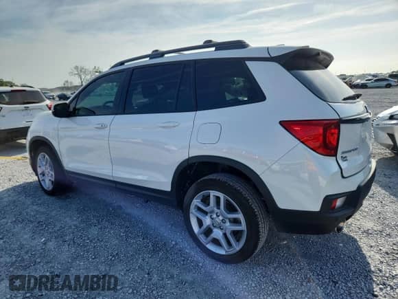 2025 Honda Passport EX-L with VIN 5FNYF8H57SB014949, listed as a Copart auction lot 58587185 with 4,403 mi miles and Salvage title. Bid and sale history available at DreamBid. Image 2.
