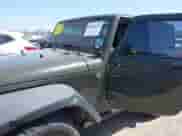 2015 Jeep Wrangler Sport with VIN 1C4AJWAGXFL650428, listed as a IAAI auction lot 42010629 with 80,039 mi miles and . Bid and sale history available at DreamBid. Image 6.