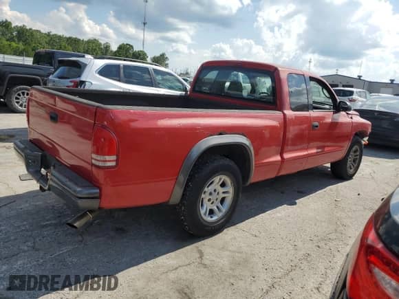 2002 Dodge Dakota с VIN 1B7GL12X32S528404, выставлен на аукционе Copart как лот 62110475 с пробегом Не указан миль и Списание • Salvage title. История ставок и продаж доступна на DreamBid. Изображение 3.