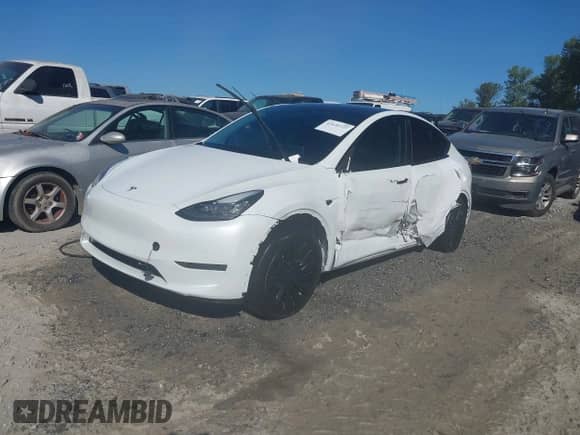2022 Tesla Model Y Long Range z VIN 7SAYGDEE5NF321358, wystawiony jako IAAI lot #43439727 z przebiegiem 24 003 mil mil oraz . Historia ofert i sprzedaży dostępna na DreamBid. Obrazek 2.