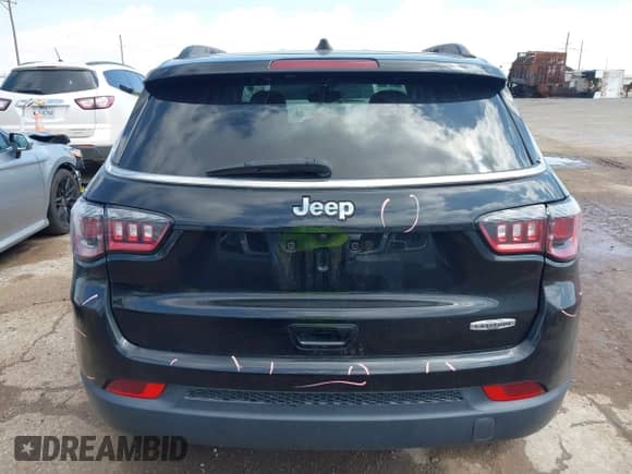2021 Jeep Compass Altitude with VIN 3C4NJCBB8MT592615, listed as a IAAI auction lot 42424280 with 65,392 mi miles and . Bid and sale history available at DreamBid. Image 16.