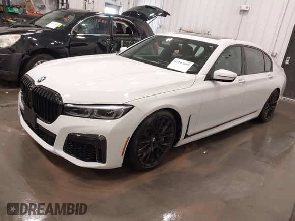 2022 BMW 7 Series 750i xDrive with VIN WBA7U2C03NCG89838, listed as a IAAI auction lot 42187695 with 27,443 mi miles and . Bid and sale history available at DreamBid. Image 2.