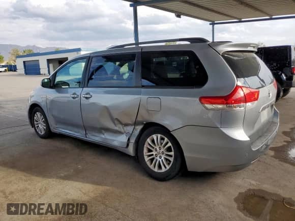 2011 Toyota Sienna XLE AAS with VIN 5TDYK3DC8BS163434, listed as a Copart auction lot 86107225 with 156,266 mi miles and Salvage title. Bid and sale history available at DreamBid. Image 2.