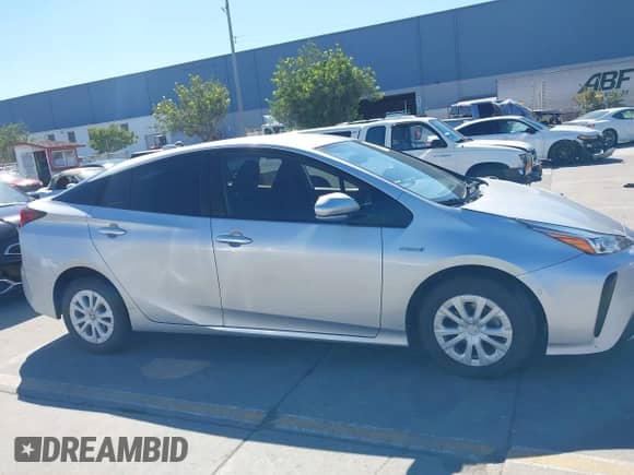 2020 Toyota Prius L Eco with VIN JTDKARFU2L3118901, listed as a IAAI auction lot 43373660 with 147,420 mi miles and . Bid and sale history available at DreamBid. Image 14.