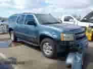 2009 Chevrolet Suburban 2LT z VIN 1GNFC26059R226166, wystawiony jako IAAI lot #43264407 z przebiegiem 131 813 mil mil oraz . Historia ofert i sprzedaży dostępna na DreamBid. Obrazek 1.