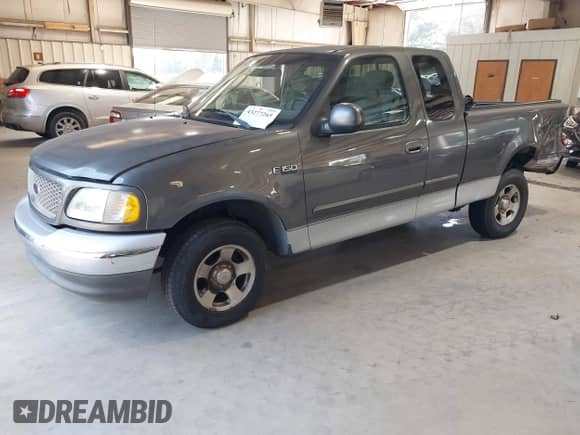2002 Ford F-150 XL with VIN 1FTRX17292NC01028, listed as a IAAI auction lot 43277265 with Not provided miles and . Bid and sale history available at DreamBid. Image 18.