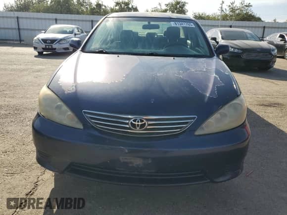 2005 Toyota Camry LE с VIN 4T1BE30K95U412300, выставлен на аукционе Copart как лот 81341765 с пробегом 307 894 миль миль и Списание • Salvage title. История ставок и продаж доступна на DreamBid. Изображение 5.