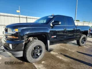 2017 Chevrolet Silverado 1500 LT with VIN 1GCVKRECXHZ406267, listed as a Copart auction lot 83979985 with 170,474 mi miles and Salvage title. Bid and sale history available at DreamBid. Image 1.