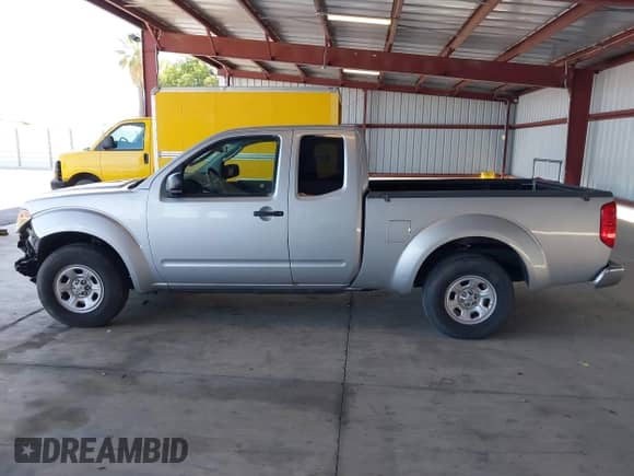 2006 Nissan Frontier XE with VIN 1N6BD06TX6C456493, listed as a IAAI auction lot 42586275 with 166,187 mi miles and . Bid and sale history available at DreamBid. Image 14.