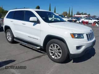 2015 Jeep Grand Cherokee Altitude z VIN 1C4RJFAG7FC122784, wystawiony jako IAAI lot #43438452 z przebiegiem 140 946 mil mil oraz . Historia ofert i sprzedaży dostępna na DreamBid. Obrazek 1.