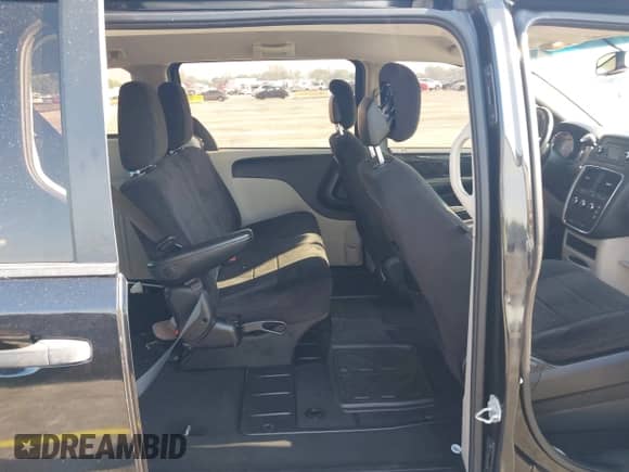 2014 Dodge Grand Caravan American Value with VIN 2C4RDGBG9ER162902, listed as a IAAI auction lot 43043596 with 89,719 mi miles and . Bid and sale history available at DreamBid. Image 8.