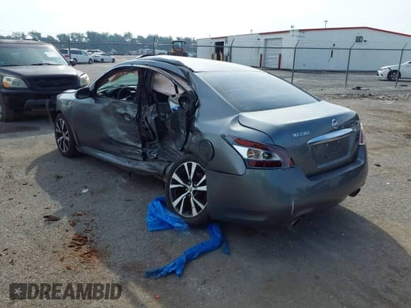 2014 Nissan Maxima SV z VIN 1N4AA5AP9EC446668, wystawiony jako IAAI lot #42846517 z przebiegiem 278 952 mil mil oraz . Historia ofert i sprzedaży dostępna na DreamBid. Obrazek 3.