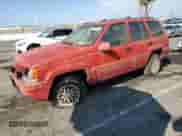 1994 Jeep Grand Cherokee Limited z VIN 1J4GZ78Y2RC101344, wystawiony jako Copart lot #83863965 z przebiegiem 129 830 mil mil oraz Czysty tytuł • Clean title. Historia ofert i sprzedaży dostępna na DreamBid. Obrazek 1.