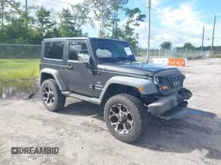 2010 Jeep Wrangler Islander z VIN 1J4GA2D1XAL141114, wystawiony jako IAAI lot #43338871 z przebiegiem 172 407 mil mil oraz . Historia ofert i sprzedaży dostępna na DreamBid. Obrazek 1.