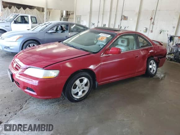 2001 Honda Accord EX with VIN 1HGCG32501A015730, listed as a Copart auction lot 84596885 with 217,416 mi miles and Salvage title. Bid and sale history available at DreamBid. Image 1.