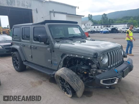 2022 Jeep Wrangler Unlimited Sahara with VIN 1C4JJXP64NW232223, listed as a IAAI auction lot 42641049 with 32,903 mi miles and . Bid and sale history available at DreamBid. Image 1.