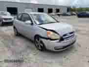 2007 Hyundai Accent SE z VIN KMHCN36C67U020057, wystawiony jako Copart lot #61012645 z przebiegiem 155 714 mil mil oraz Szkoda całkowita • Salvage title. Historia ofert i sprzedaży dostępna na DreamBid. Obrazek 13.
