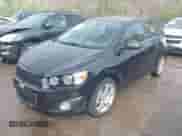 2014 Chevrolet Sonic LTZ with VIN 1G1JE6SBXE4212257, listed as a IAAI auction lot 41916104 with 71,956 mi miles and . Bid and sale history available at DreamBid. Image 2.