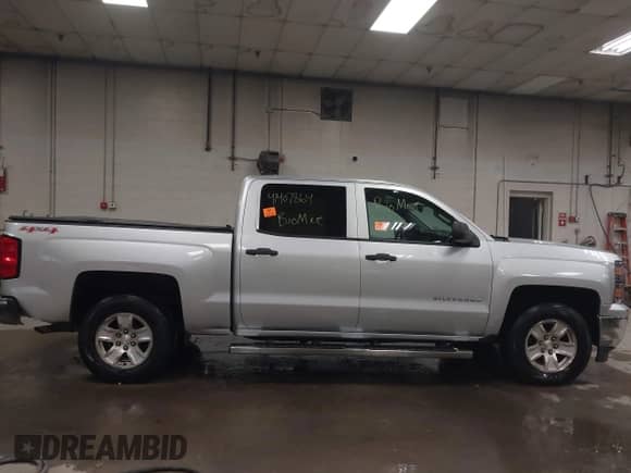 2014 Chevrolet Silverado 1500 LT with VIN 3GCUKREH9EG178197, listed as a IAAI auction lot 41407864 with 54,232 mi miles and . Bid and sale history available at DreamBid. Image 13.
