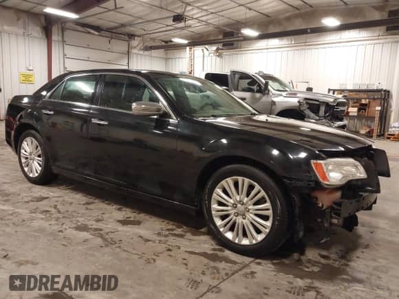 2013 Chrysler 300 C with VIN 2C3CCAKT6DH652872, listed as a IAAI auction lot 42344656 with 110,028 mi miles and . Bid and sale history available at DreamBid. Image 1.
