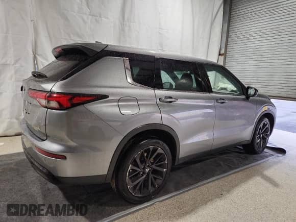 2023 Mitsubishi Outlander SE with VIN JA4J3UA81PZ027280, listed as a Copart auction lot 86450985 with 53,940 mi miles and Salvage title. Bid and sale history available at DreamBid. Image 3.