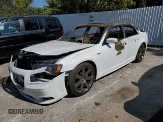 2014 Chrysler 300 SRT-8 with VIN 2C3CCAFJ1EH118429, listed as a Copart auction lot 88139865 with Not provided miles and Non repairable. Bid and sale history available at DreamBid. Image 1.